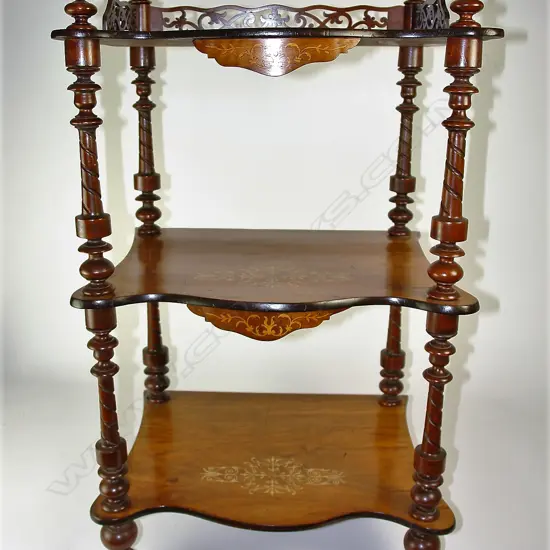 A Victorian inlaid walnut whatnot
