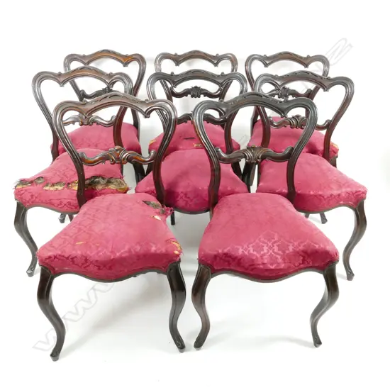 A set of eight Victorian rosewood balloon back dining chairs