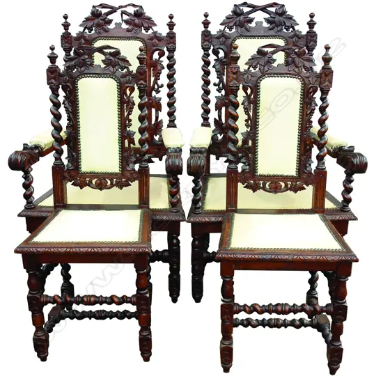 A c.1920s banquet extension oak barley twist dining table and 12 chairs