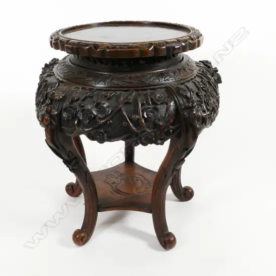 A late 19thC Chinese carved rosewood large vase stand