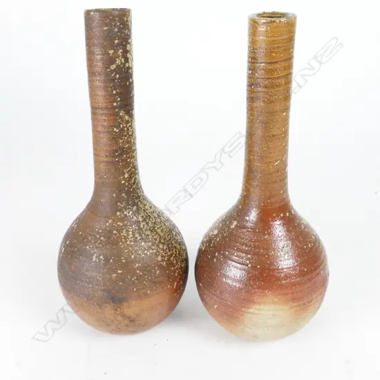 Two tall branch Japanese Bizen branch pots