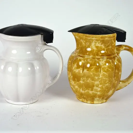Two Temuka Ware pottery electric jugs