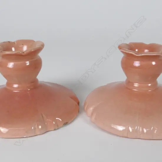 A pair of O.C. Stephens candlesticks