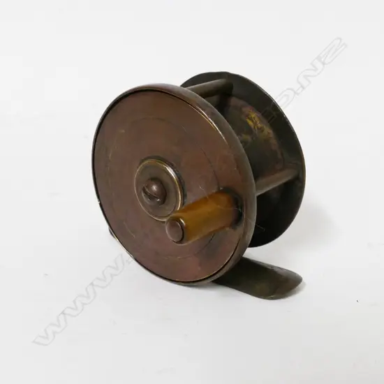 A 2" McCarthys (Dunedin) brass centre pin reel