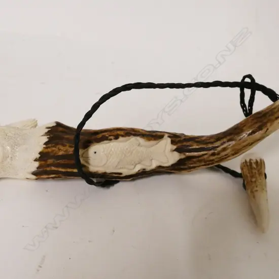 A 9¼" carved deer antler angler's priest