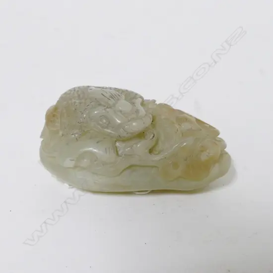 A Chinese jade handling piece