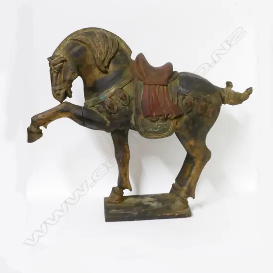 A decorative carved wood Tang style horse