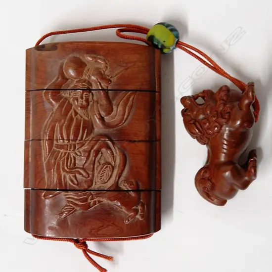 A Chinese four section carved wood inro