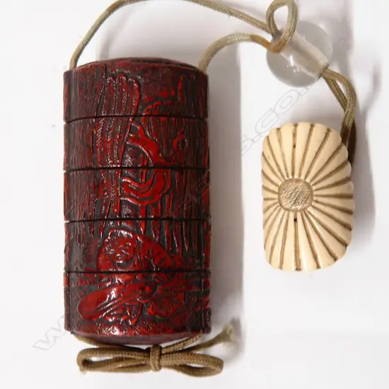 An old Japanese red lacquer inro