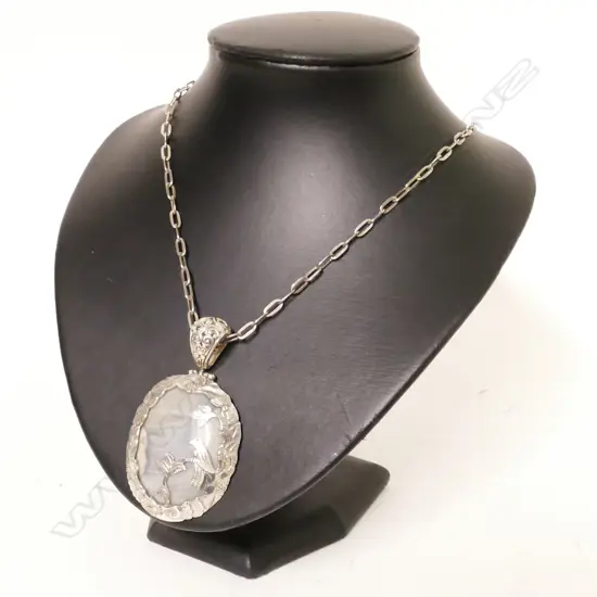 A silver and quartz pendant