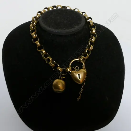 A 9ct. gold charm bracelet