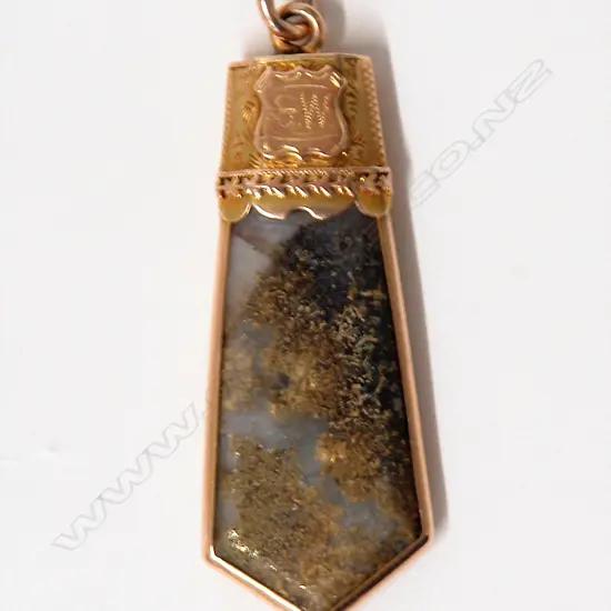 A good N.Z. Colonial 15ct. yellow gold and gold bearing quartz fob