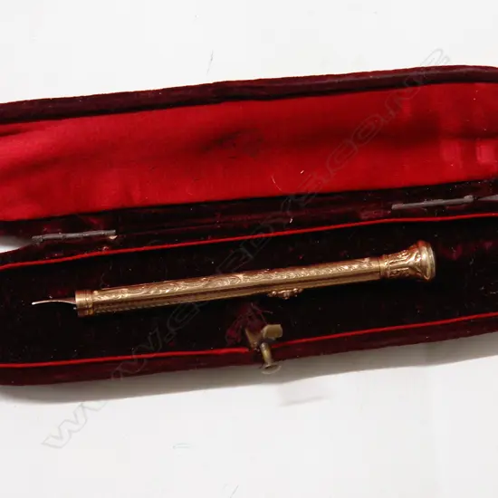 A c.1900 9ct. yellow gold propelling combination pen and pencil