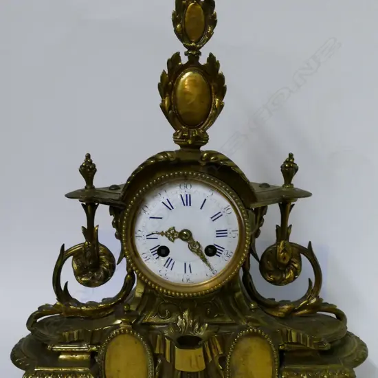 A French Louis XV style mantel clock