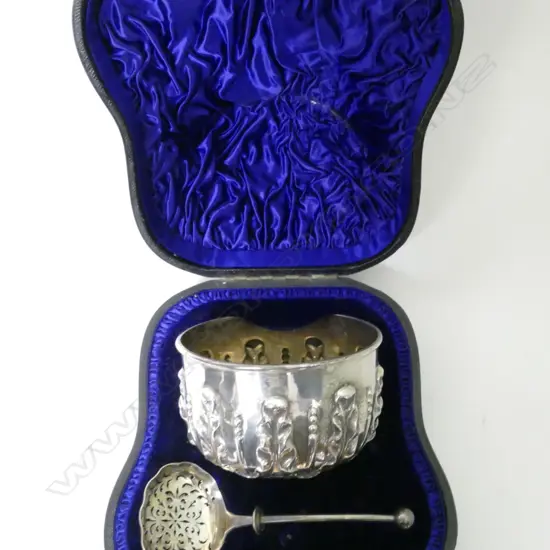 A Victorian silver sugar bowl and sifter spoon in case