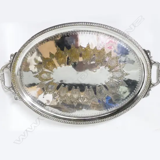 A heavy silver plate butler's tray