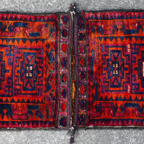 A hand knotted Persian Qashqai saddlebag