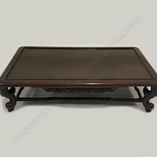 A rosewood vase table