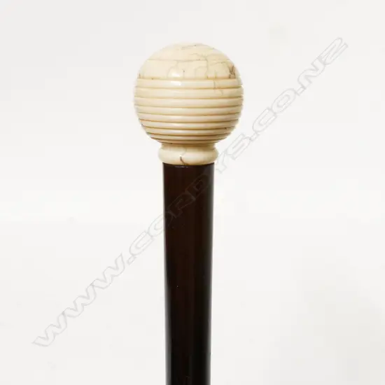 A 19thC ebonised rosewood walking stick