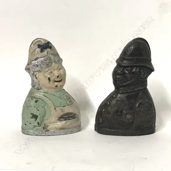 A pair of early 1900 antique English police money banks