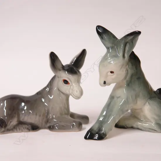 Two Crown Lynn stylised donkey sculptures