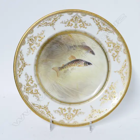 A Royal Doulton hand painted plate