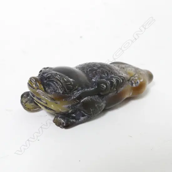 A carved Chinese jade handling piece