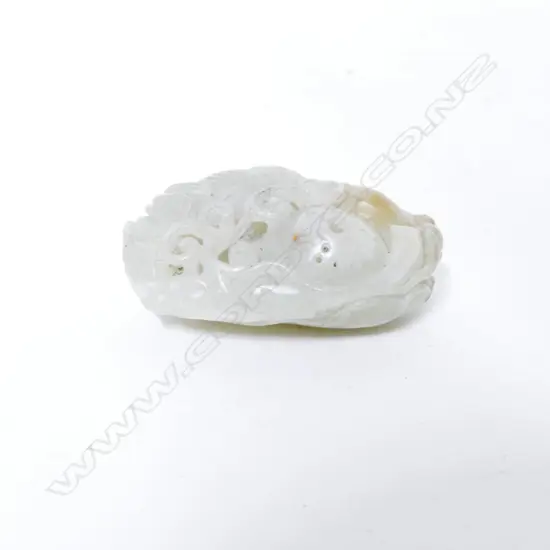 A carved Chinese jade handling piece