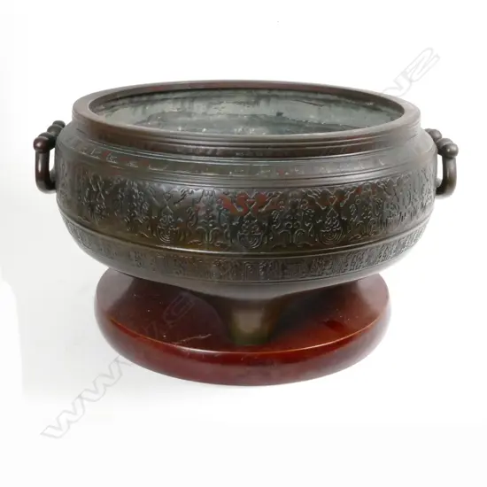 A large old Japanese bronze two-handled fire pot