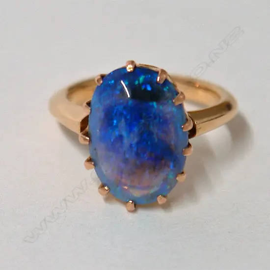 A vintage 18ct. yellow gold and opal dress ring