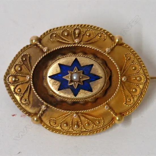 A Victorian 15ct. yellow gold enamel and pearl Etruscan brooch