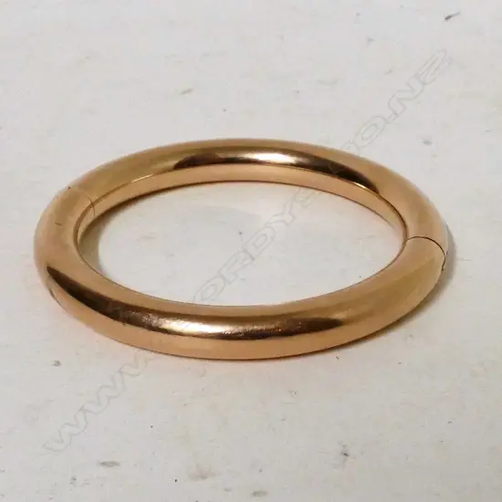 An antique gold plated bangle