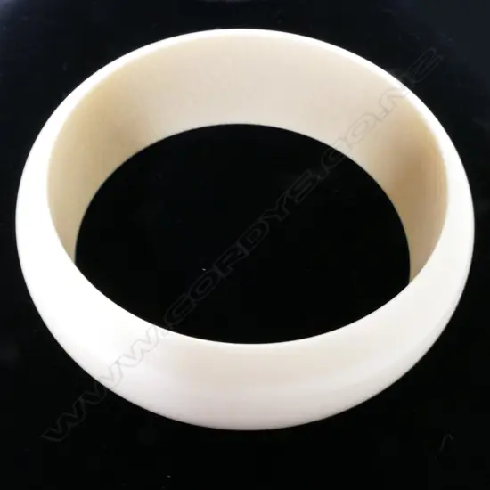 A vintage ivory bangle