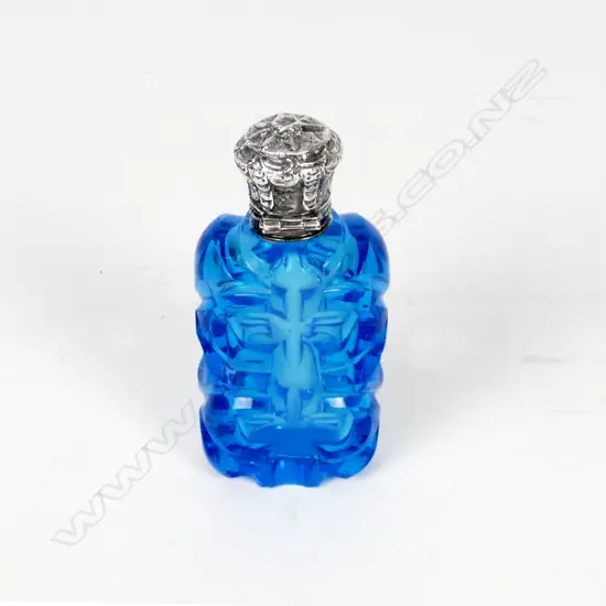 An antique French silver and blue glass perfume bottle