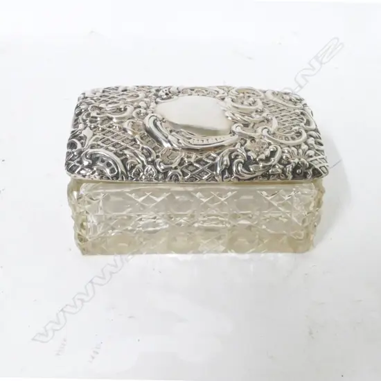 An Edwardian fancy crystal oblong dressing table jar