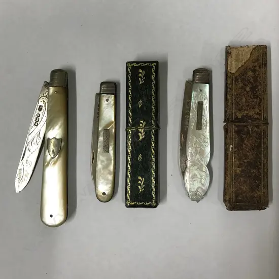 Three silver and mother-of-pearl folding fruit knives