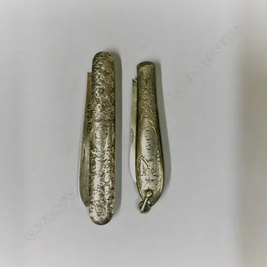 Two silver folding fruit knives