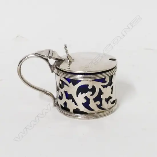 An Edwardian miniature silver mustard pot
