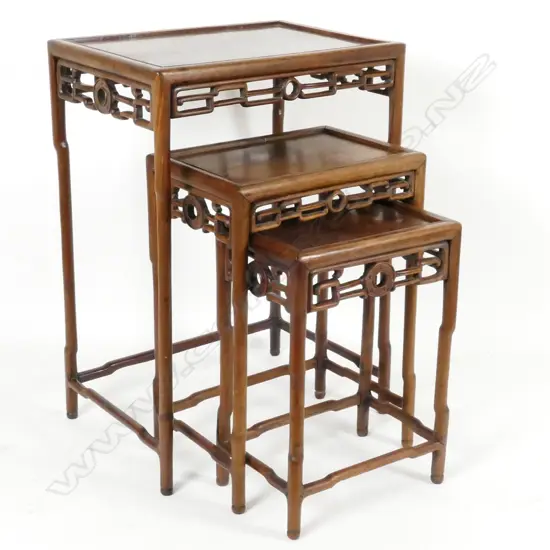 A nest of three Chinese hardwood side tables
