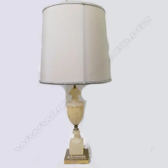 A pair of antique style alabaster and gilt metal column table lamps